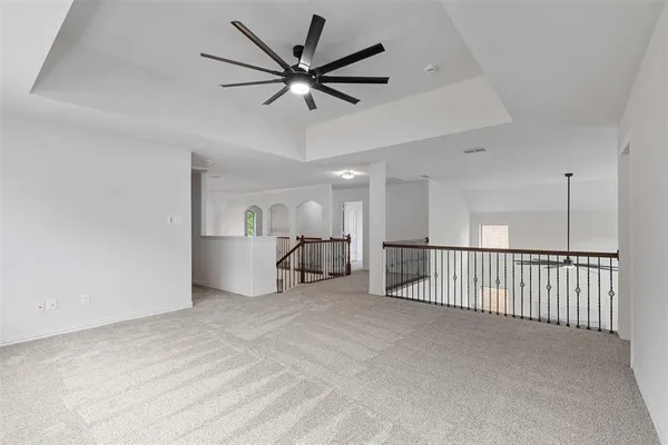 a view of a livingroom with a ceiling fan