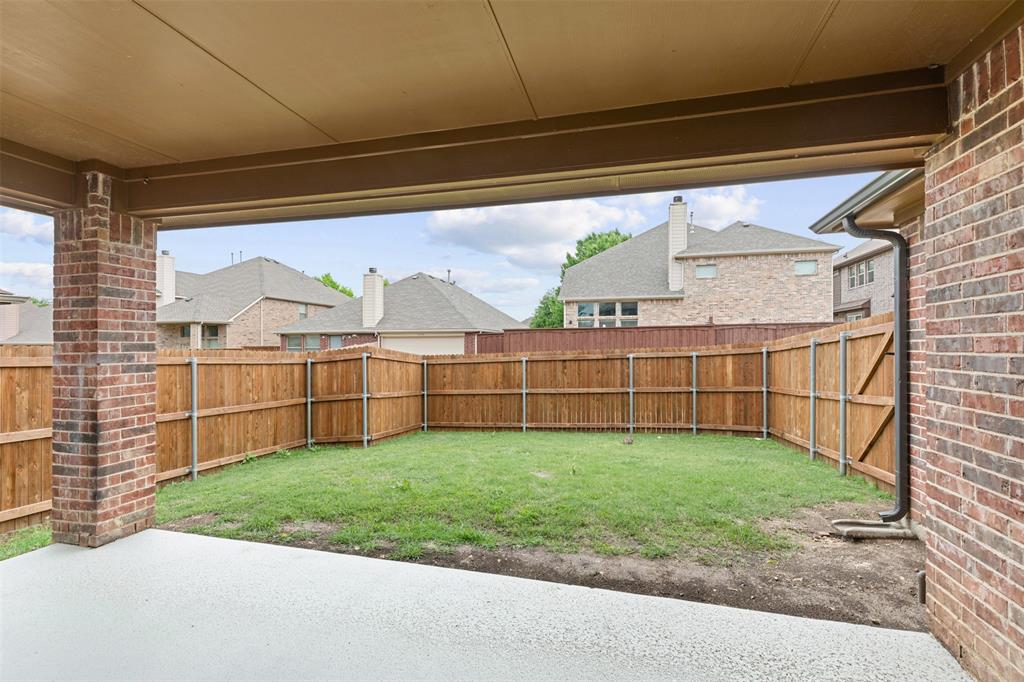 11984 Del Rio Drive Frisco, TX 75035 - Photo 36 of 38 a view of a backyard with garden