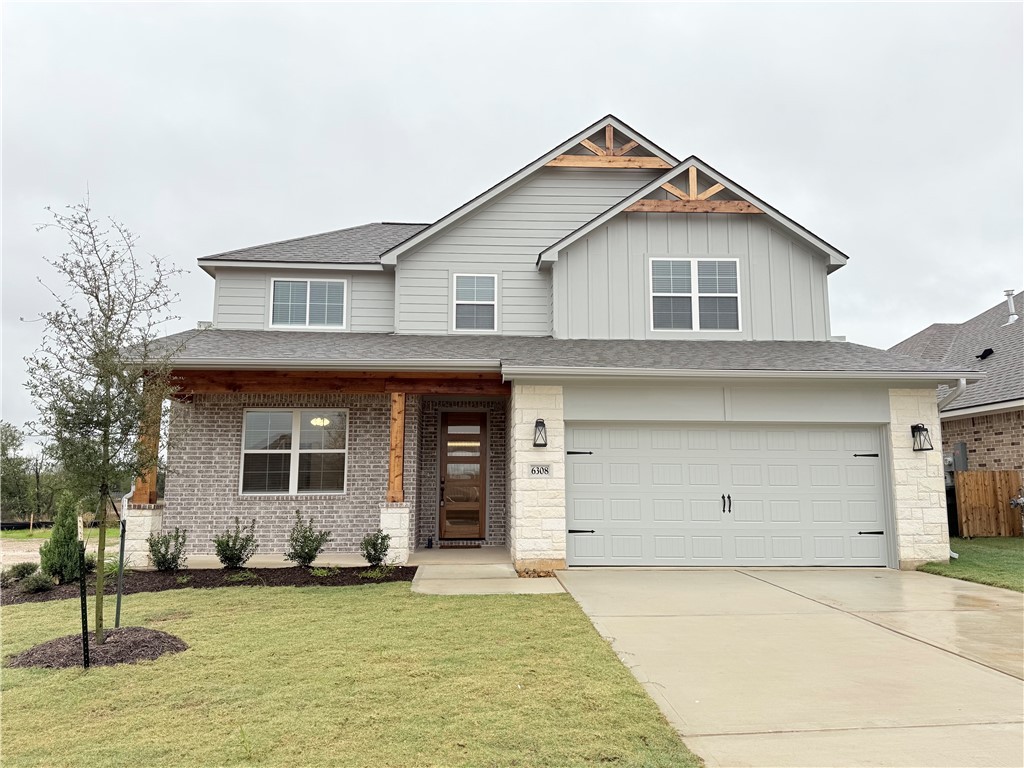 6308 Raleigh Drive College Station, TX 77845 - Photo 1 of 19 View of front of home featuring covered porch, an attached garage, a shingled roof, driveway, and board and batten siding