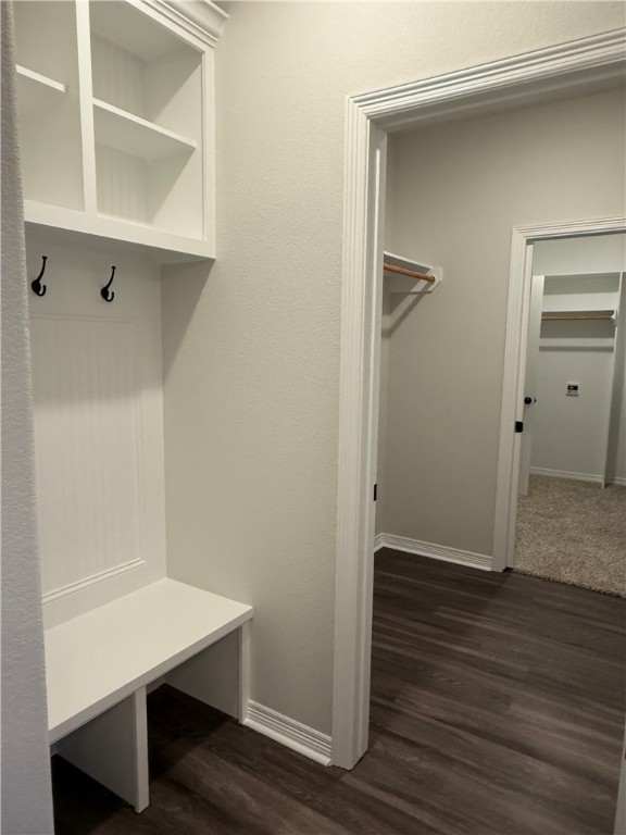 6308 Raleigh Drive College Station, TX 77845 - Photo 11 of 19 Mudroom with dark wood-style flooring and baseboards