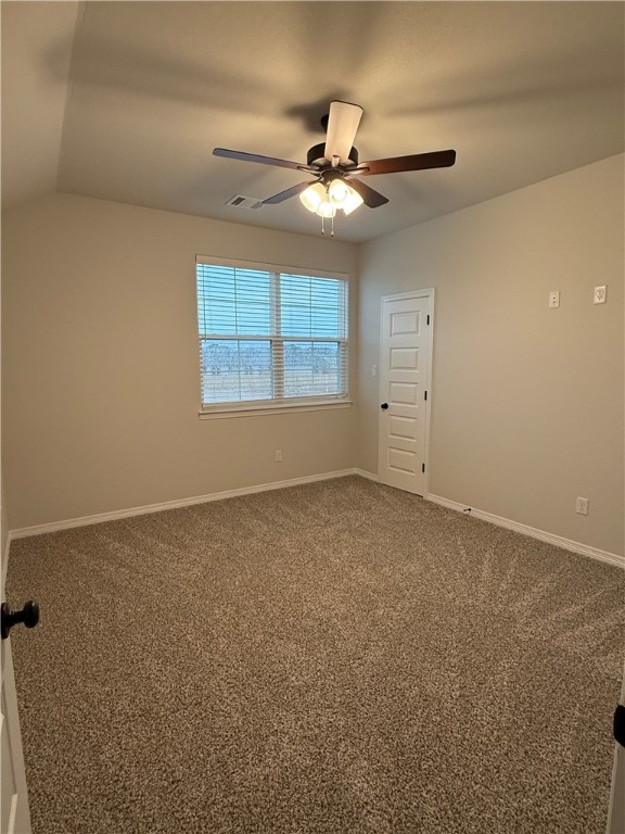 6308 Raleigh Drive College Station, TX 77845 - Photo 15 of 19 Spare room featuring carpet floors and baseboards