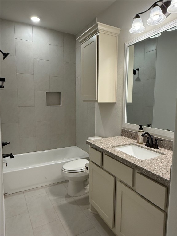 6308 Raleigh Drive College Station, TX 77845 - Photo 17 of 19 Full bathroom with vanity, shower / tub combination, and light tile patterned floors