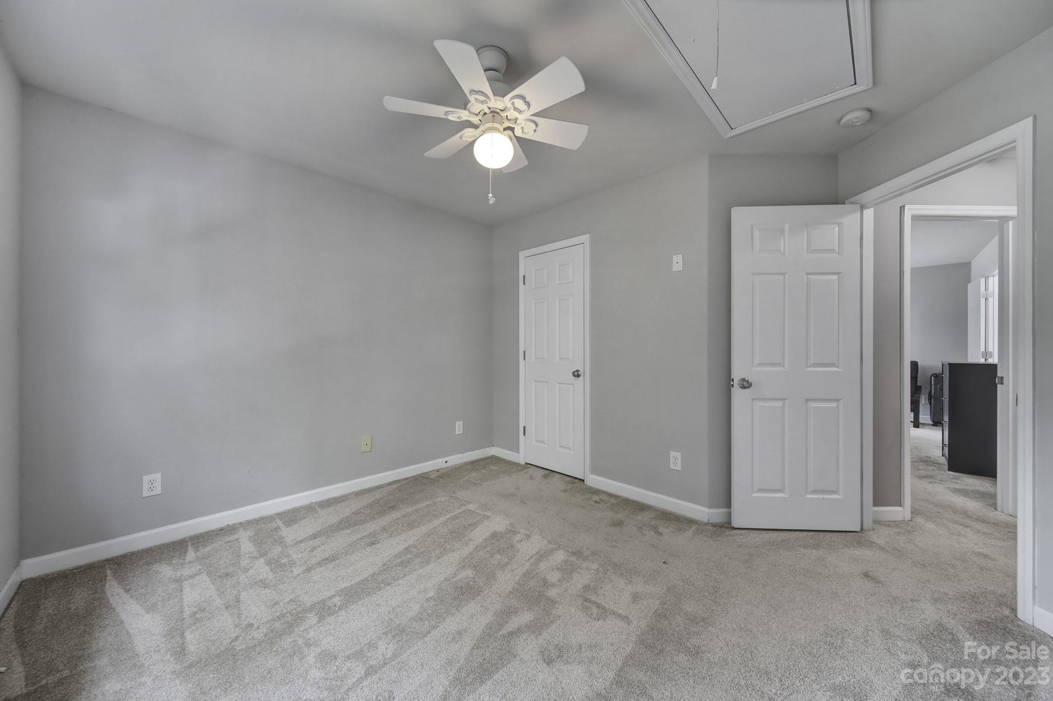 7224 Cascading Pines Drive Tega Cay, SC 29708 - Photo 25 of 36 an empty room with fan and a ceiling fan