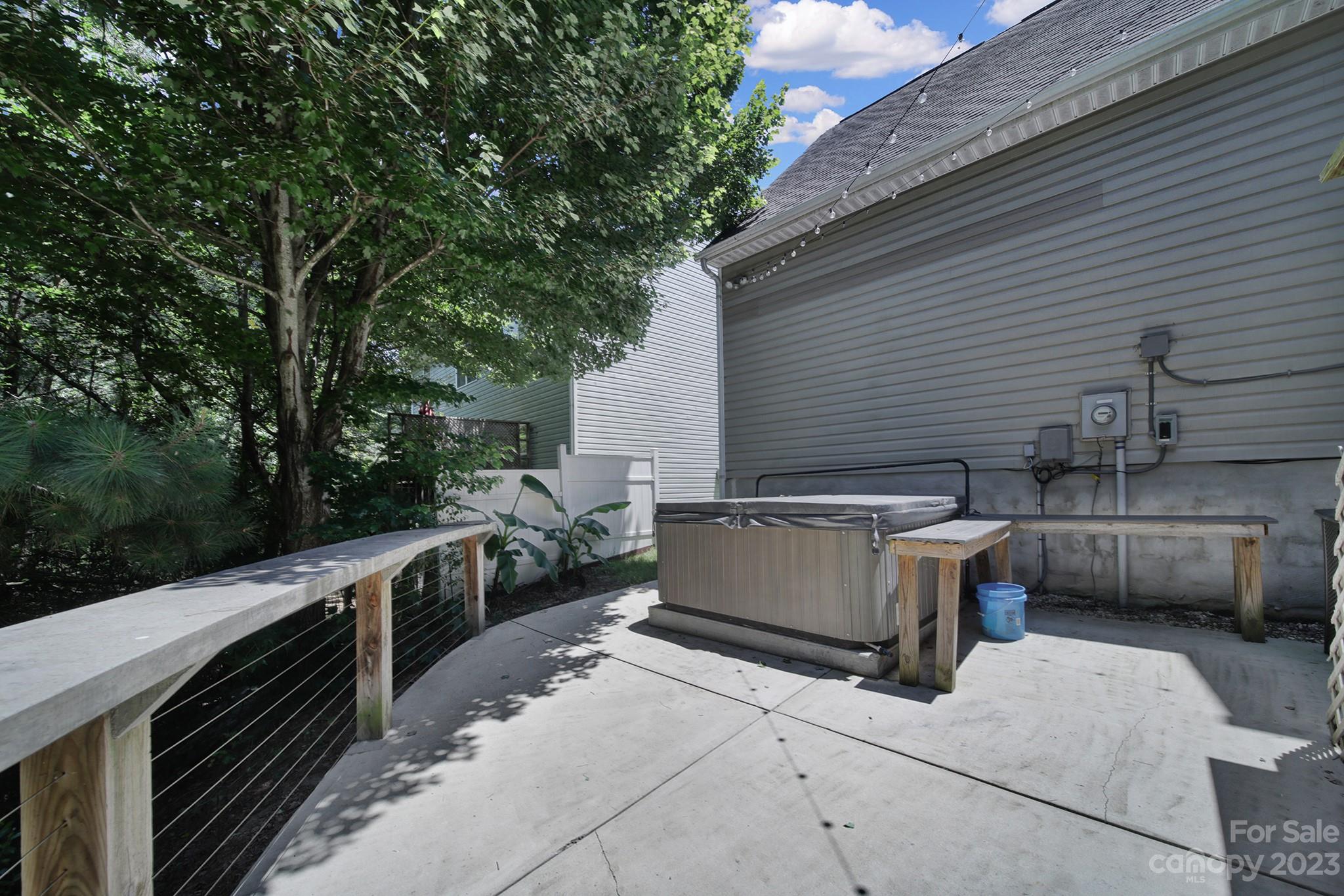 7224 Cascading Pines Drive Tega Cay, SC 29708 - Photo 34 of 36 a view of a patio with open kitchen