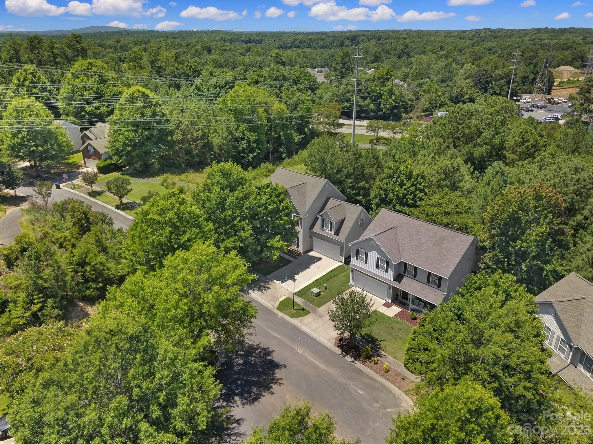 7224 Cascading Pines Drive Tega Cay, SC 29708 - Photo 35 of 36 an aerial view of a house with a yard