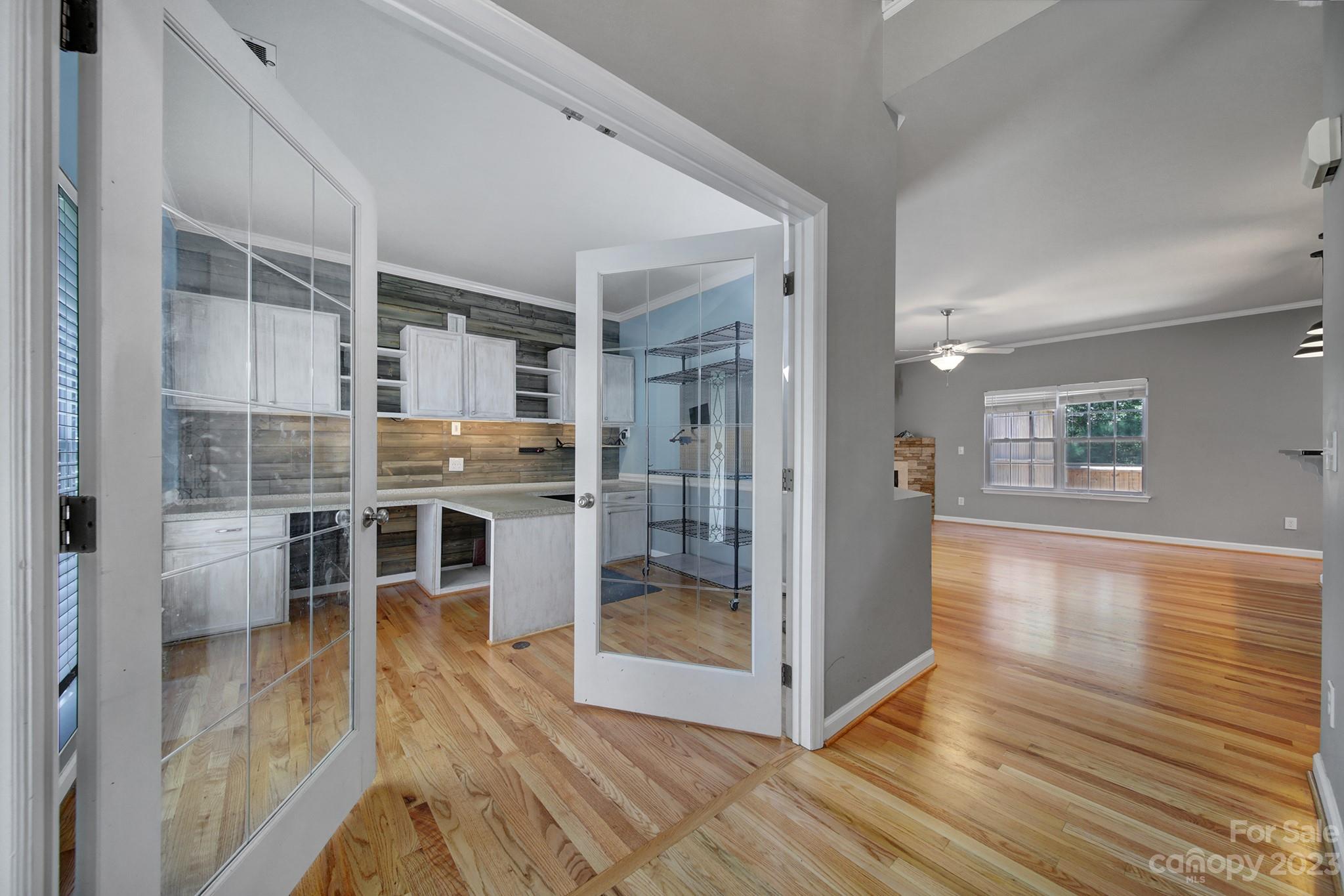 7224 Cascading Pines Drive Tega Cay, SC 29708 - Photo 4 of 36 a view of kitchen with furniture and wooden floor