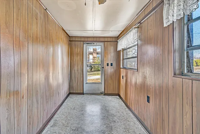a view of entryway with wooden floor