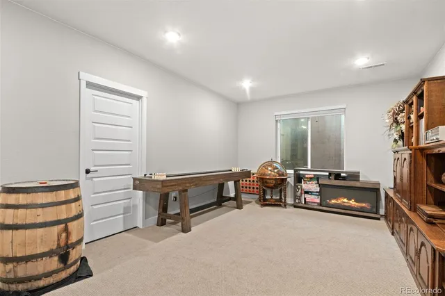 a view of a livingroom with furniture