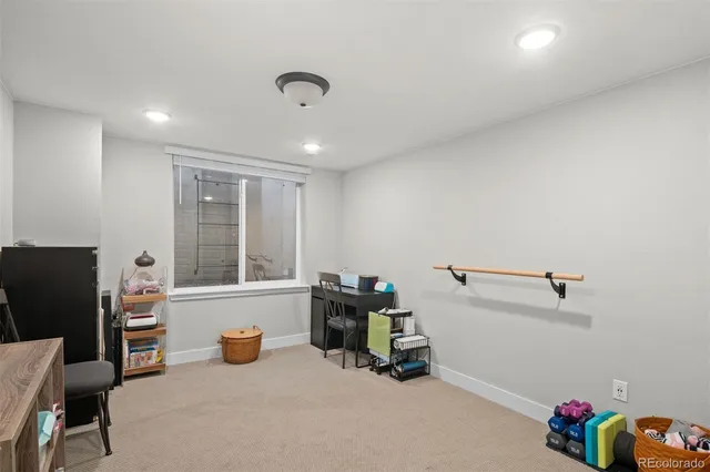 a room with furniture and a window