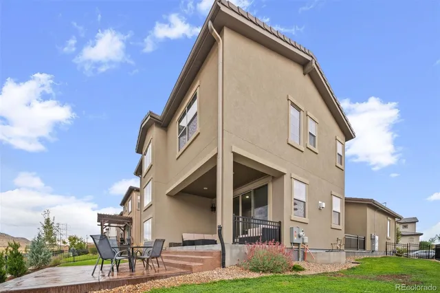a view of a building with a yard
