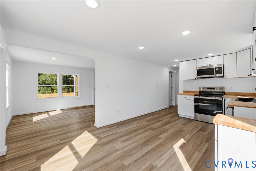 15221 Wright Road Amelia Court House, VA 23002 - Photo 10 of 22 Open-concept kitchen and living area featuring woo