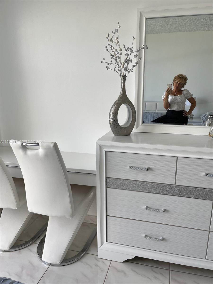 17021 North Bay Road, Unit 907 Sunny Isles Beach, FL 33160 - Photo 9 of 19 a view of entryway with furniture