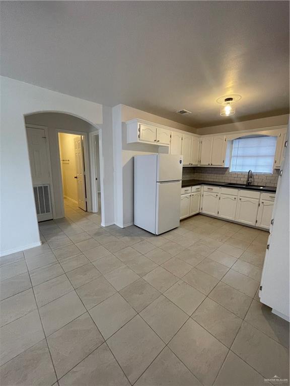1408 Pine Street, Unit C Weslaco, TX 78596 - Photo 2 of 9 Living room overlooking Kitchen