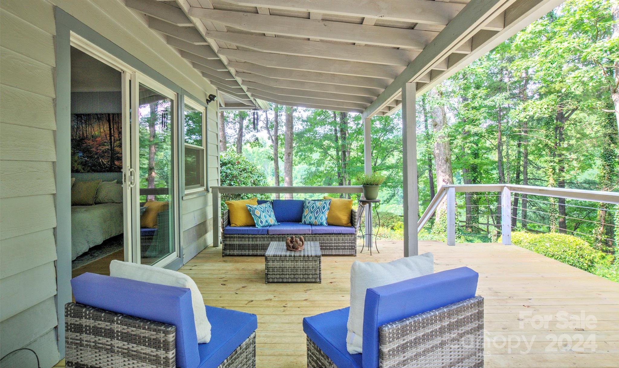 376 Page Farm Road Tryon, NC 28782 - Photo 16 of 34 a balcony with furniture and a garden