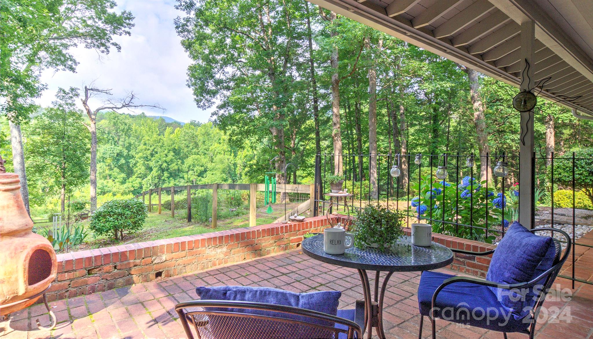 376 Page Farm Road Tryon, NC 28782 - Photo 3 of 34 a view of yard from deck with patio