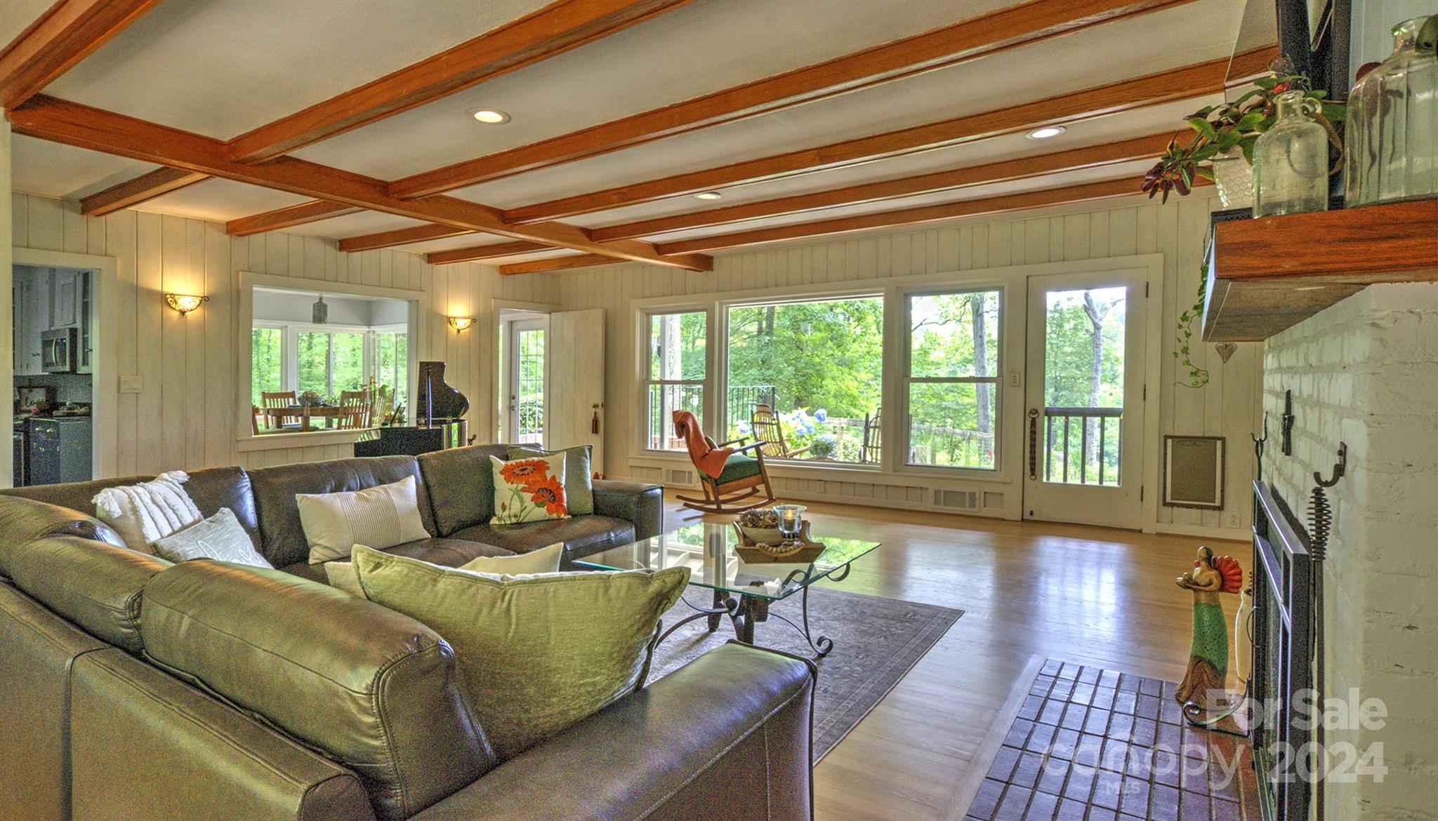 376 Page Farm Road Tryon, NC 28782 - Photo 6 of 34 a living room with furniture and a fireplace