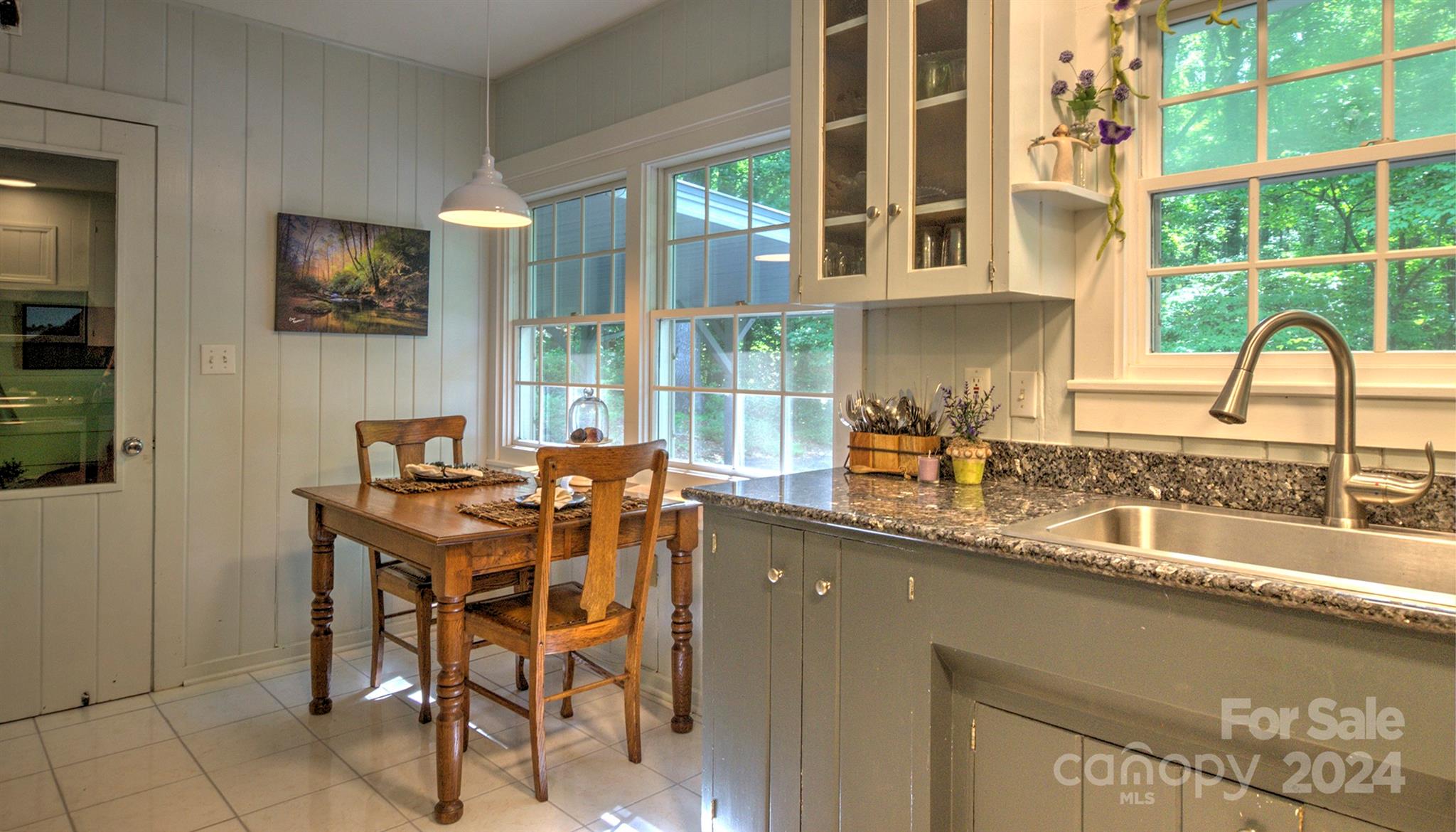 376 Page Farm Road Tryon, NC 28782 - Photo 9 of 34 a table and chairs in a kitchen next to a window