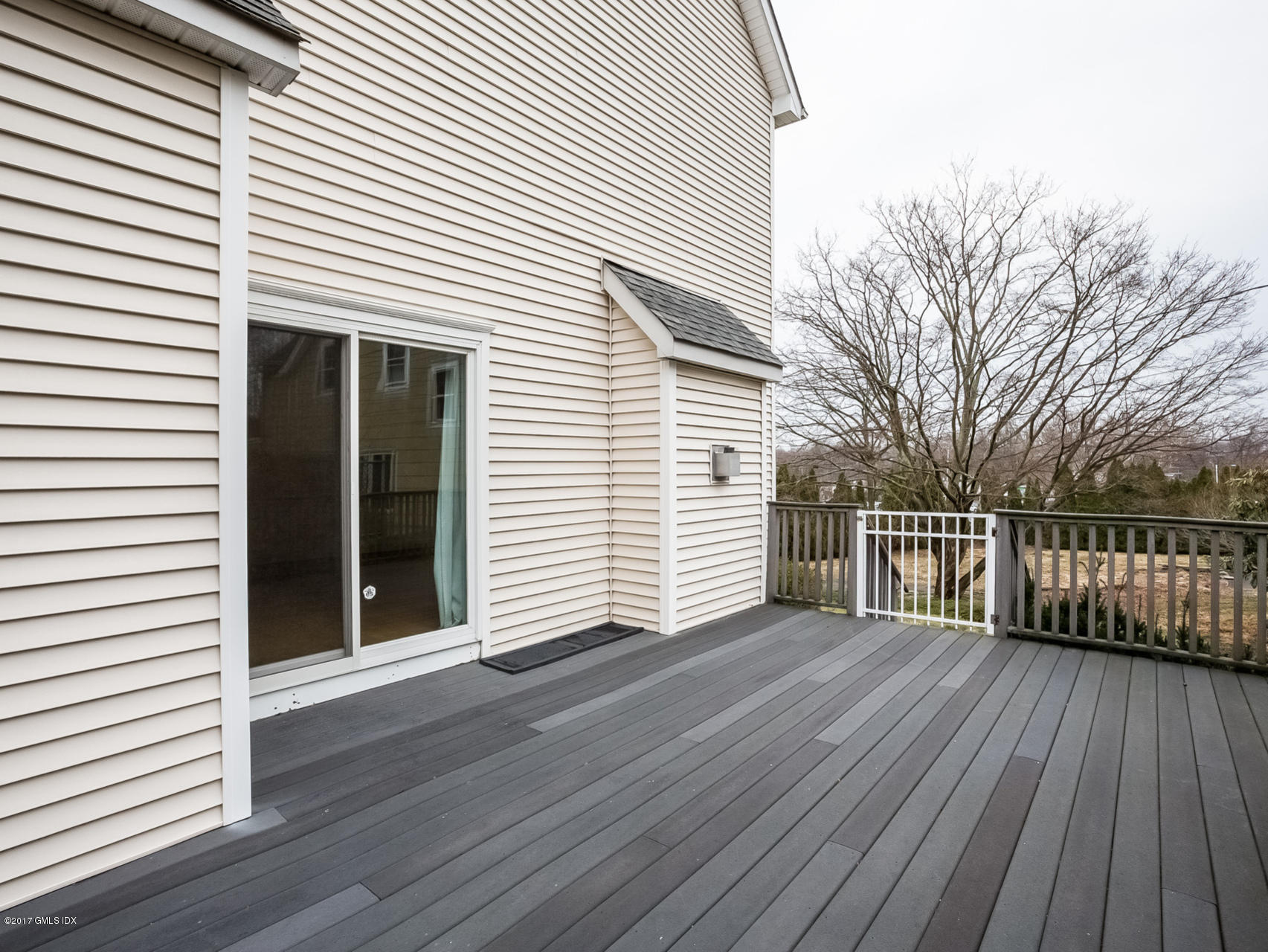10 1/2 Sound Beach Ave Extension Riverside, CT 06878 - Photo 23 of 26 a view of a house with wooden floor