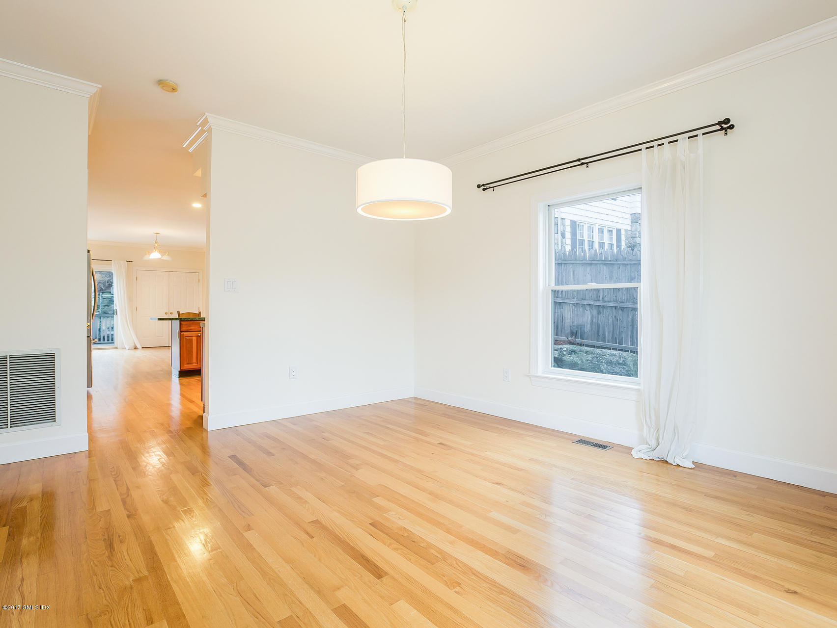 10 1/2 Sound Beach Ave Extension Riverside, CT 06878 - Photo 8 of 26 a view of a livingroom with wooden floor