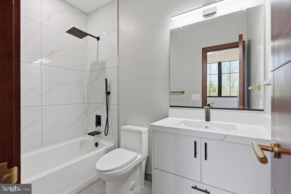 11701 Duckettown Road Bowie, MD 20720 - Photo 19 of 27 a bathroom with a sink toilet tub and shower