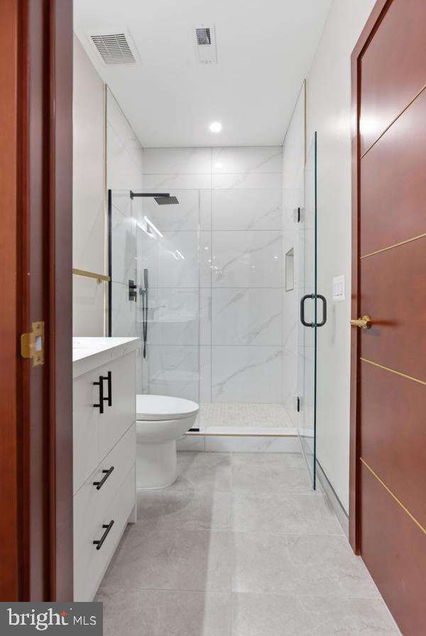 11701 Duckettown Road Bowie, MD 20720 - Photo 20 of 27 a bathroom with a bathtub and a shower