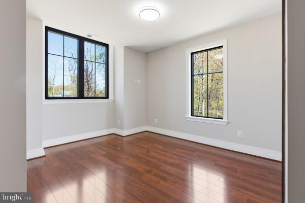 11701 Duckettown Road Bowie, MD 20720 - Photo 23 of 27 an empty room with windows and closet