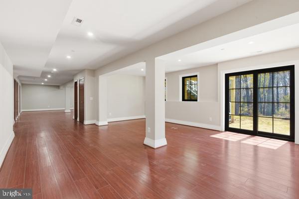 11701 Duckettown Road Bowie, MD 20720 - Photo 7 of 27 a view of an empty room with wooden floor and a window