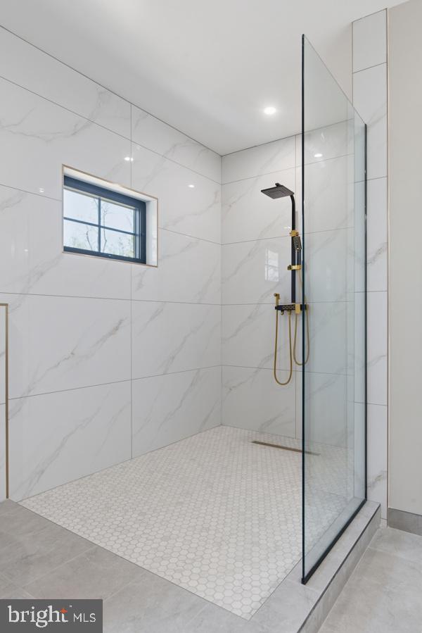 11701 Duckettown Road Bowie, MD 20720 - Photo 10 of 27 a bathroom with a shower