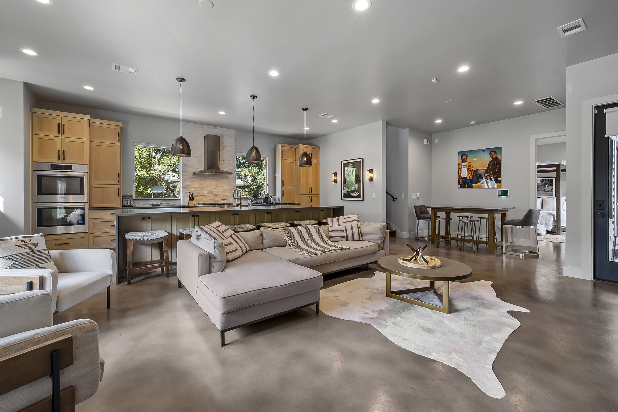 2414 Kinney Road Austin, TX 78704 - Photo 3 of 40 a living room with furniture and a painting on the wall