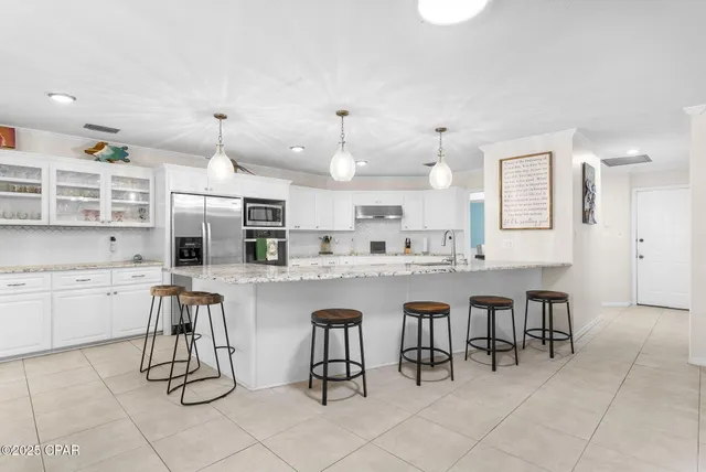 $700,000 | 105 Colony Bay Harbour Drive, Panama City Beach, FL 32407