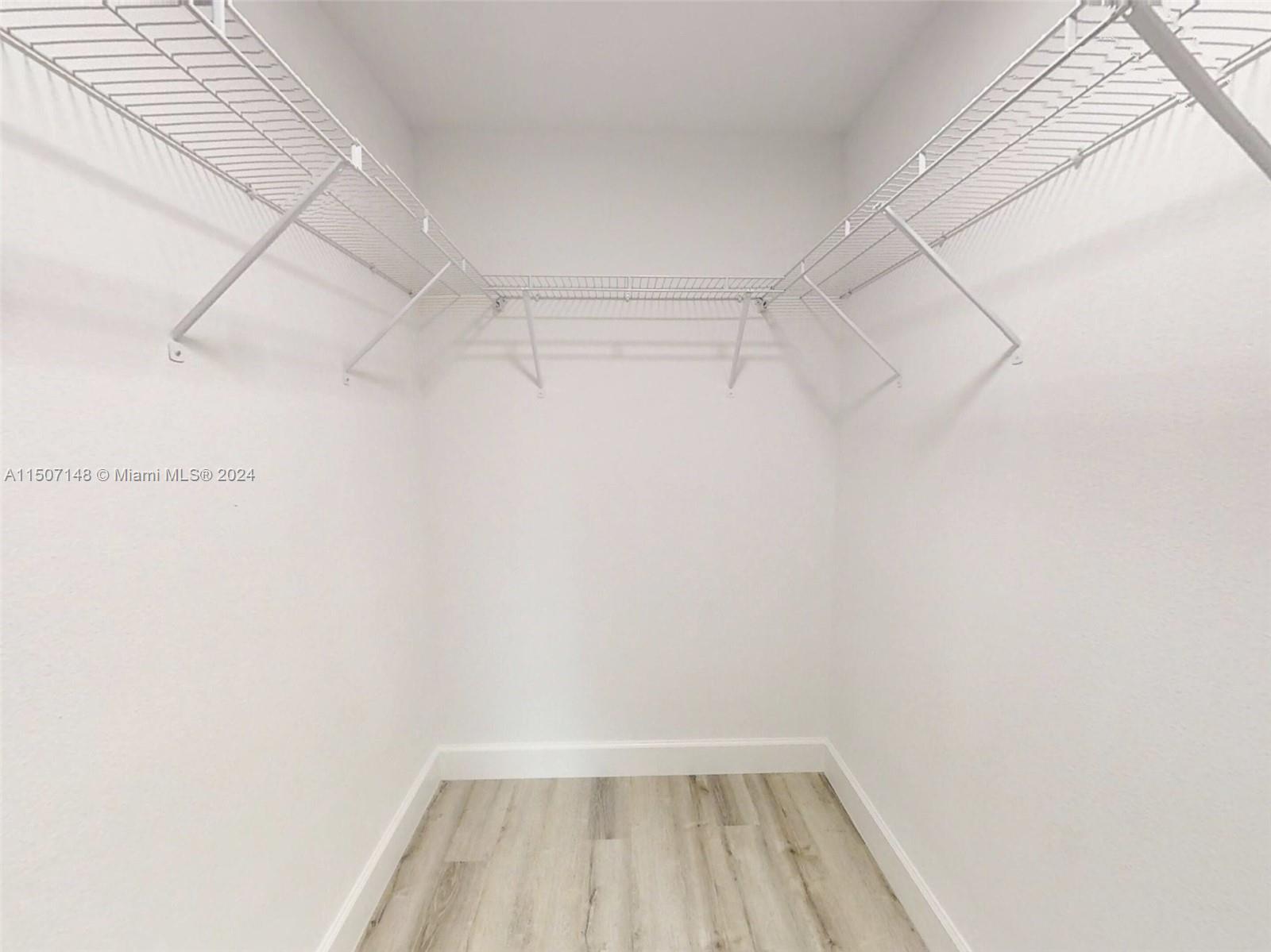 14512 Southwest 25th Lane Ocala, FL 34481 - Photo 23 of 30 a view of a room with racks on the wall