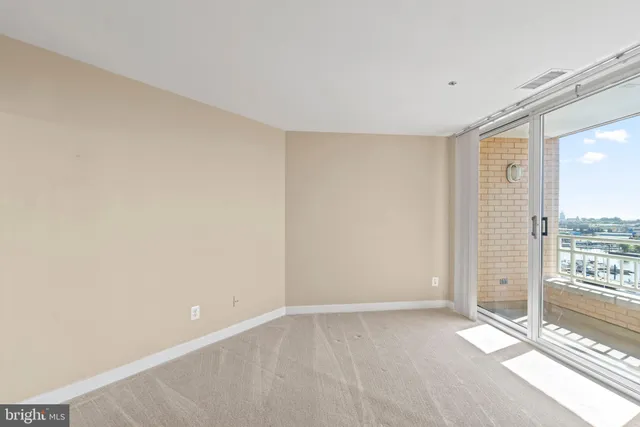 a view of a room with a large window