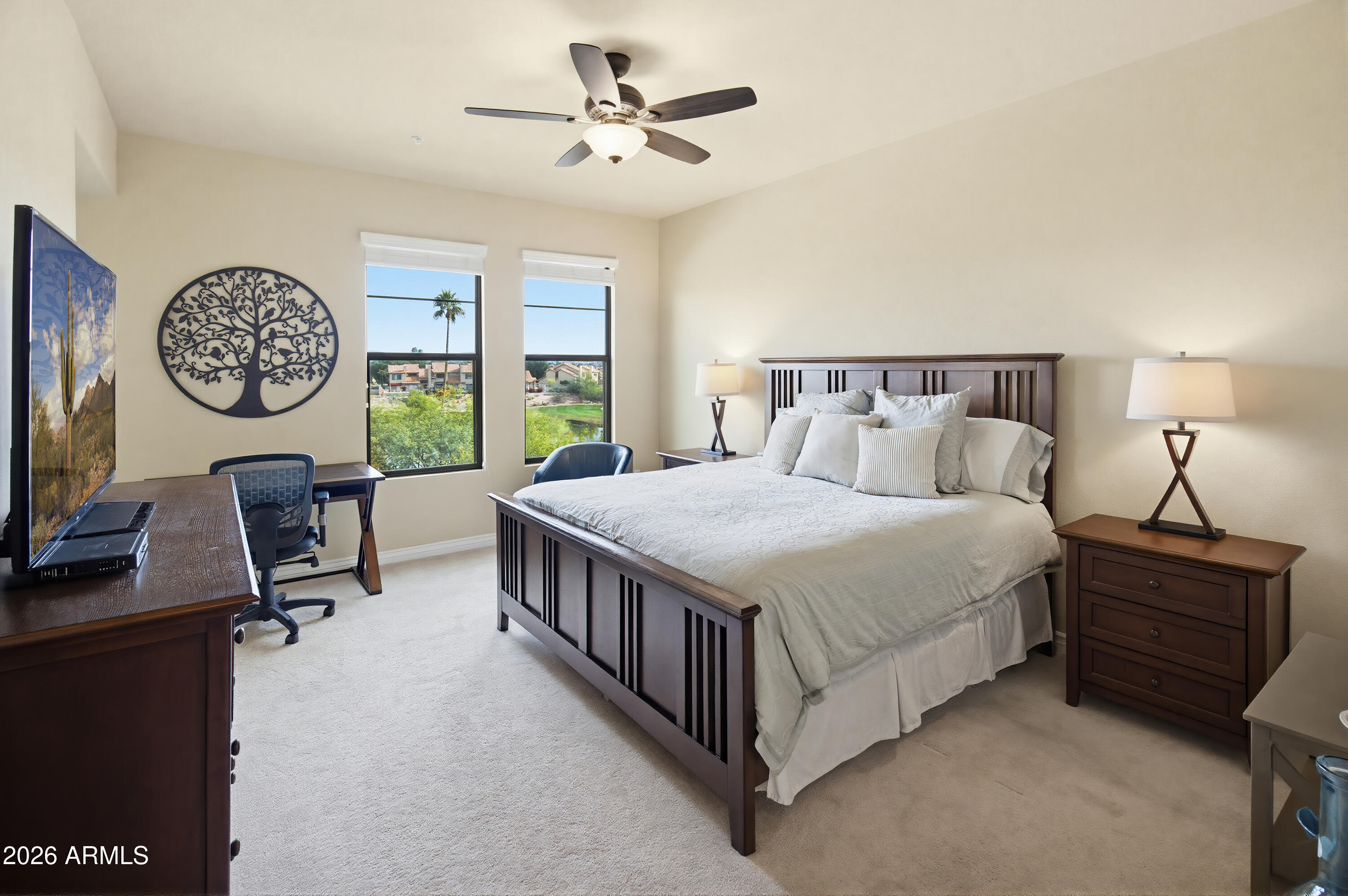7601 East Indian Bend Road, Unit 3045 Scottsdale, AZ 85250 - Photo 11 of 32 a bed room with a bed and a large window