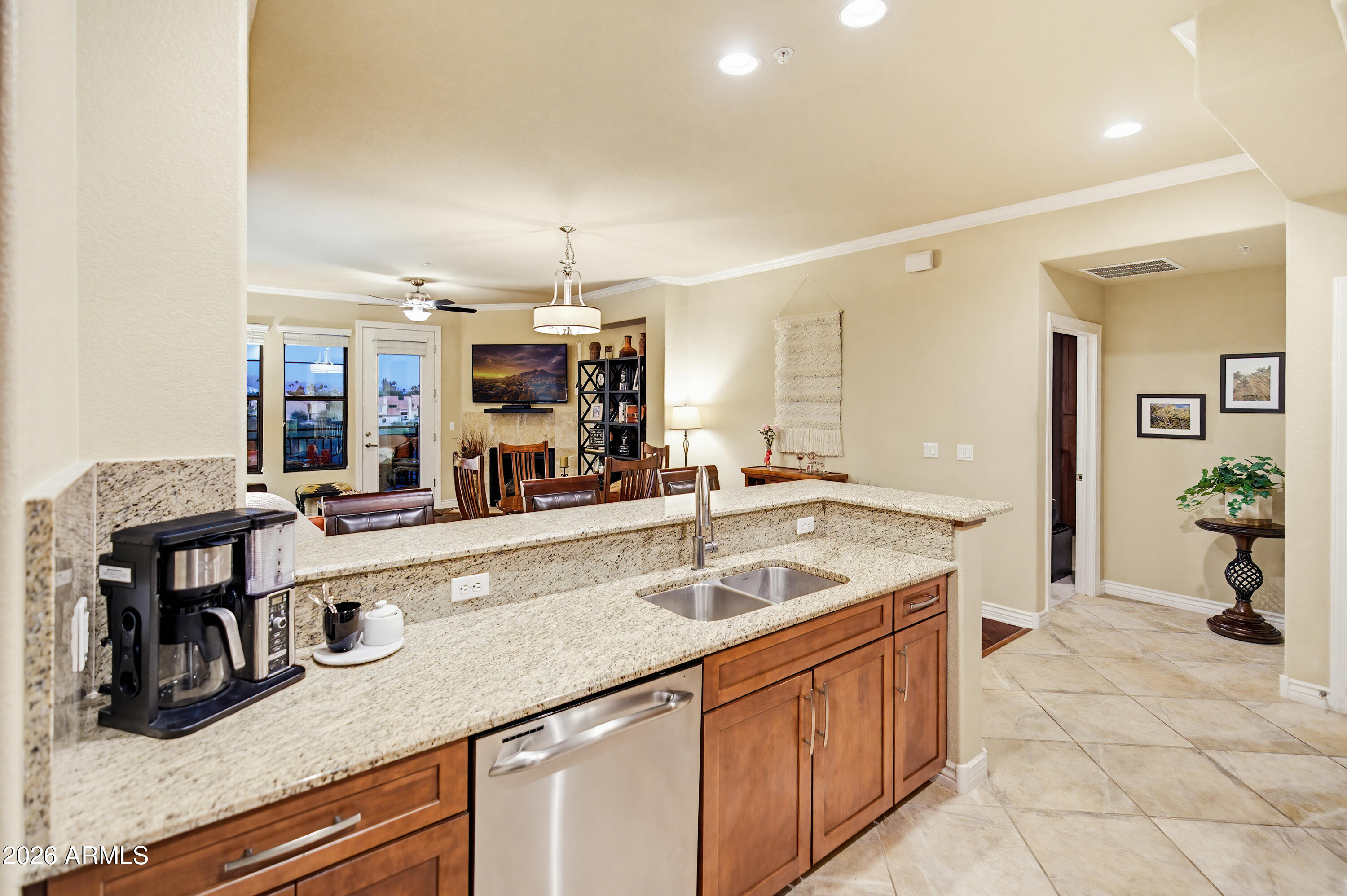 7601 East Indian Bend Road, Unit 3045 Scottsdale, AZ 85250 - Photo 9 of 32 a kitchen with a sink and cabinets