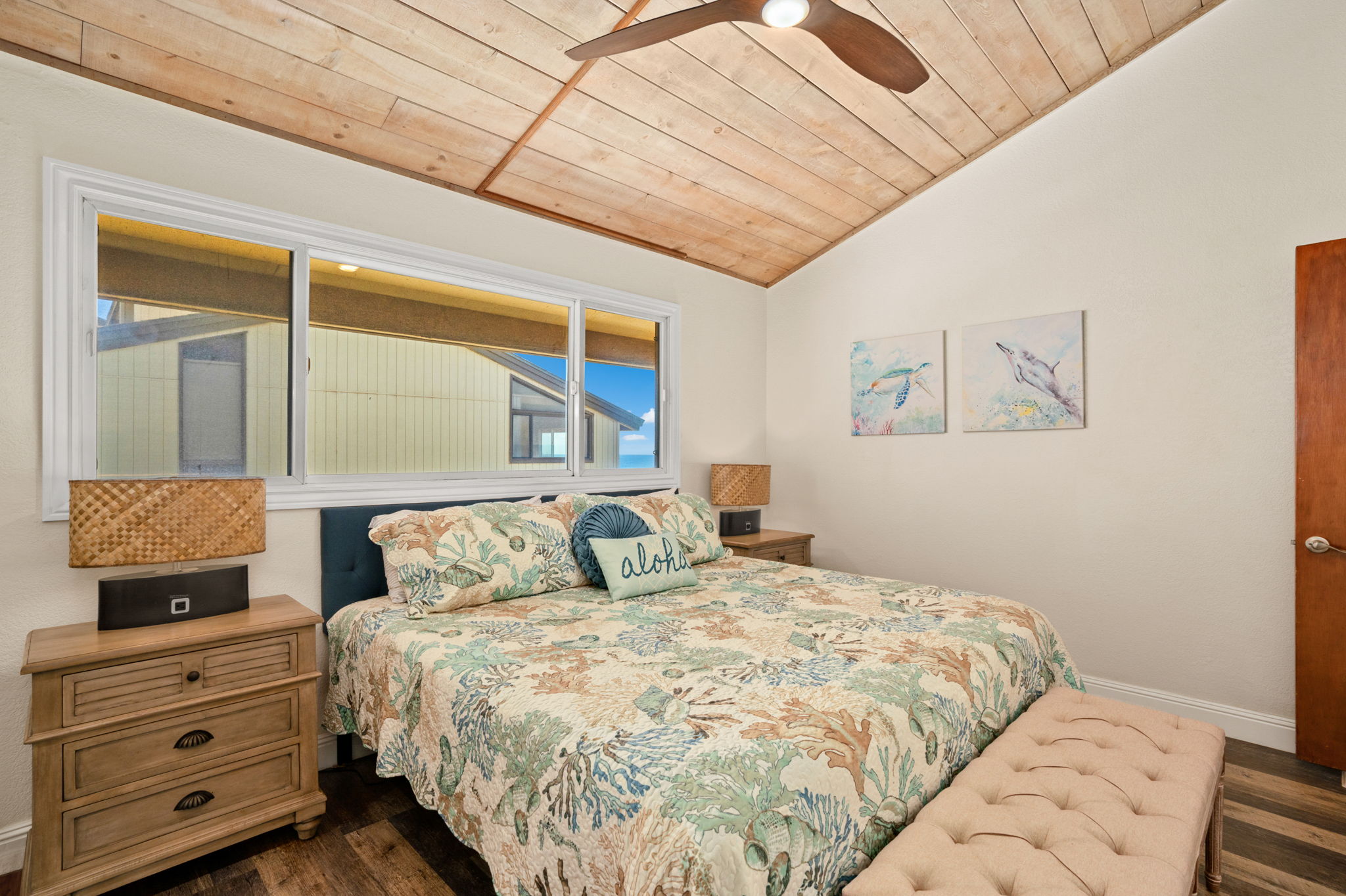 1661 Pee Road, Unit I302 Koloa, HI 96756 - Photo 13 of 30 a bedroom with a bed and a window