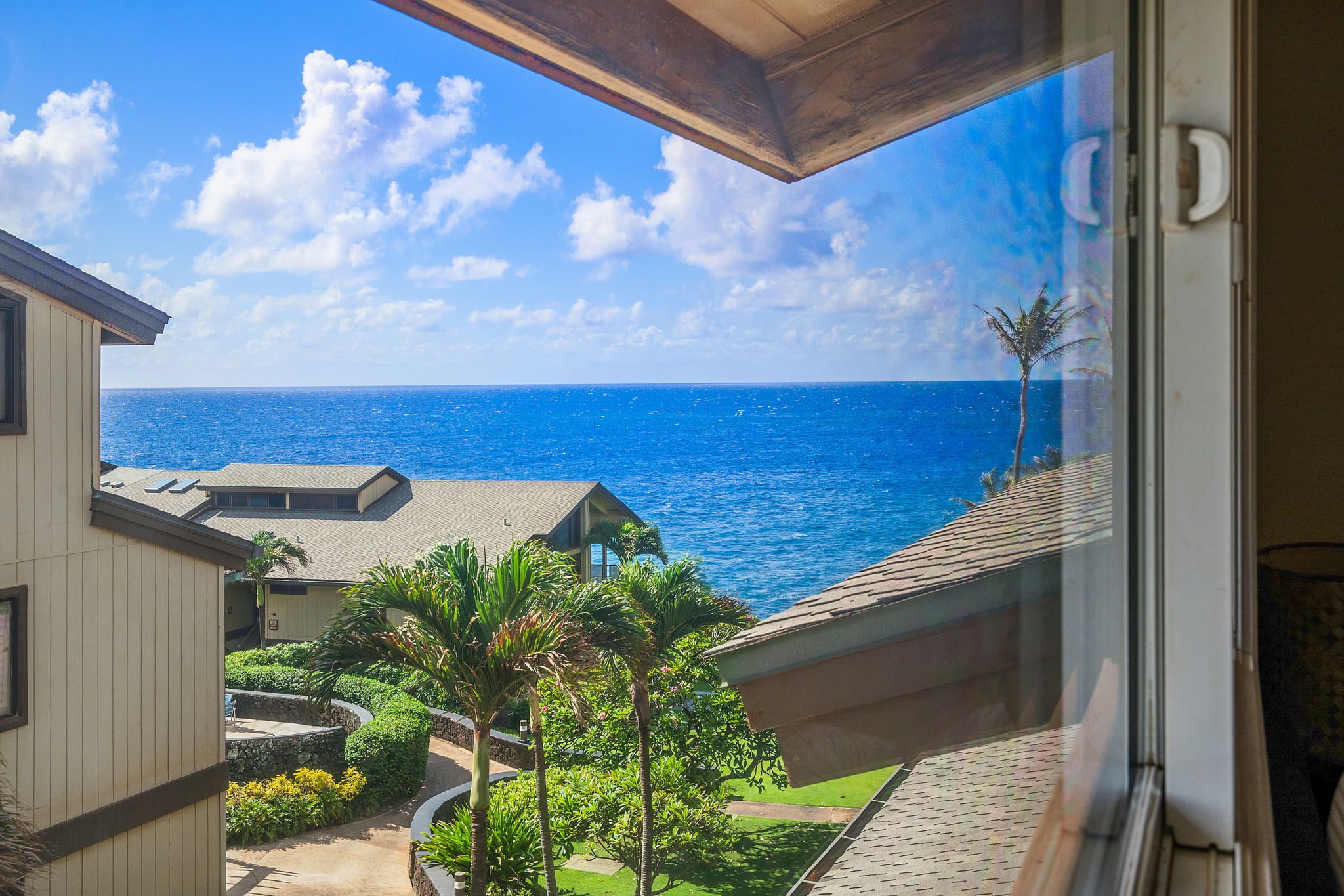 1661 Pee Road, Unit I302 Koloa, HI 96756 - Photo 23 of 30 a view of a balcony with an outdoor space