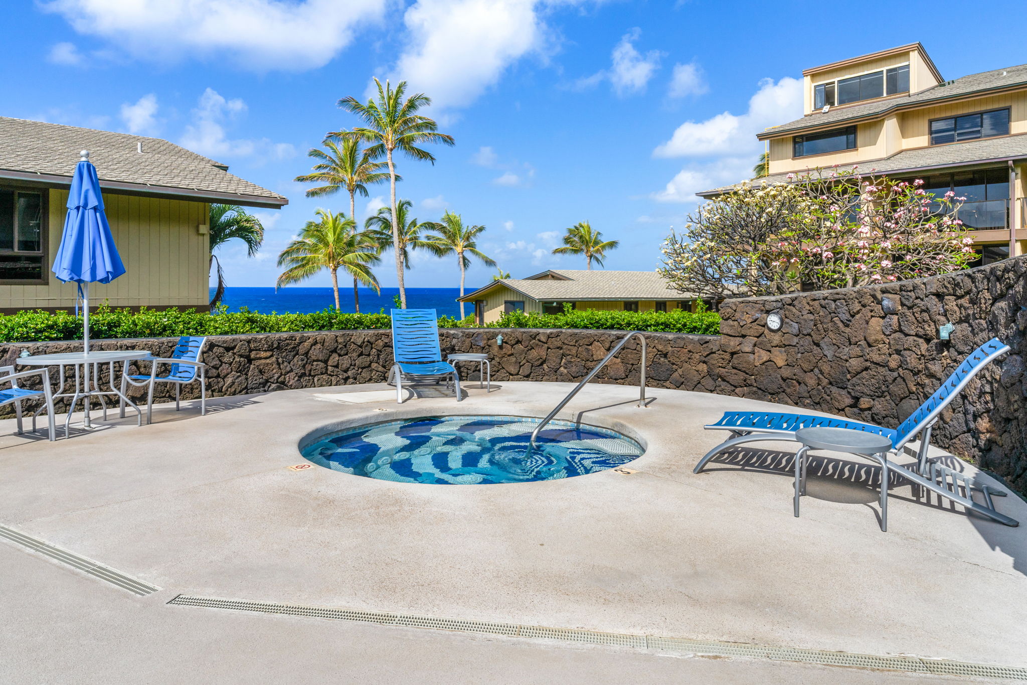 1661 Pee Road, Unit I302 Koloa, HI 96756 - Photo 30 of 30 a swimming pool with outdoor seating