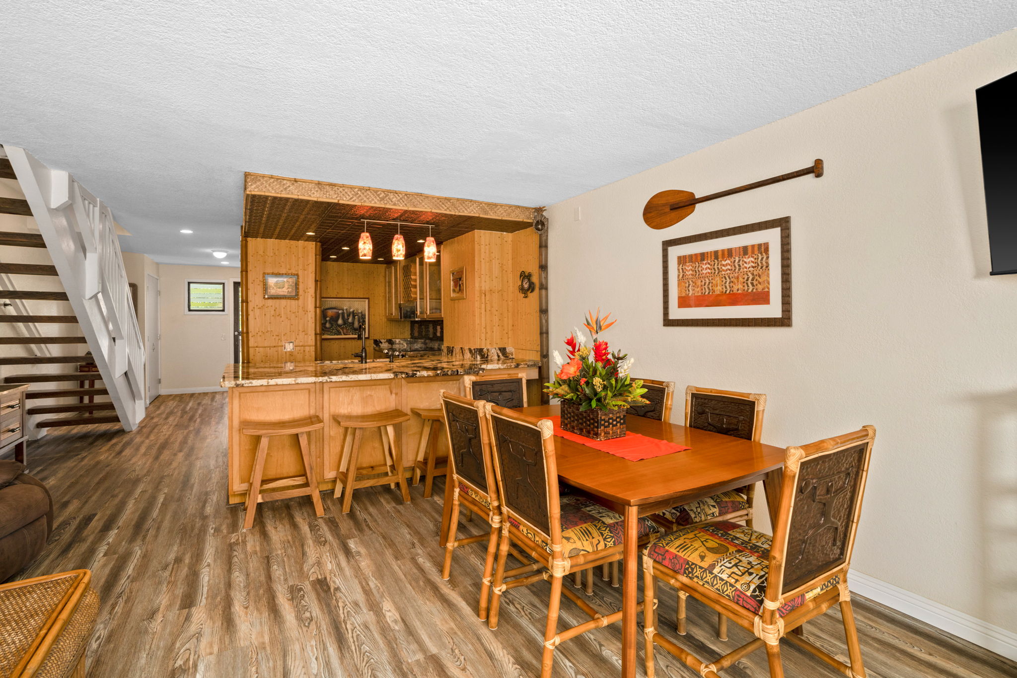1661 Pee Road, Unit I302 Koloa, HI 96756 - Photo 4 of 30 a dining room with furniture and wooden floor