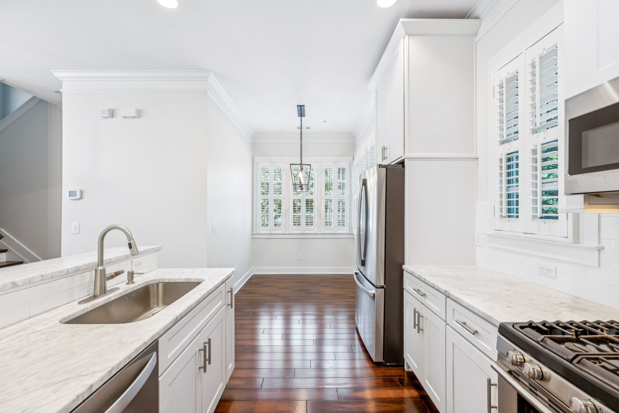 100 Cottage Lane Franklin, TN 37064 - Photo 1 of 64 a kitchen with stainless steel appliances granite countertop a sink stove and refrigerator