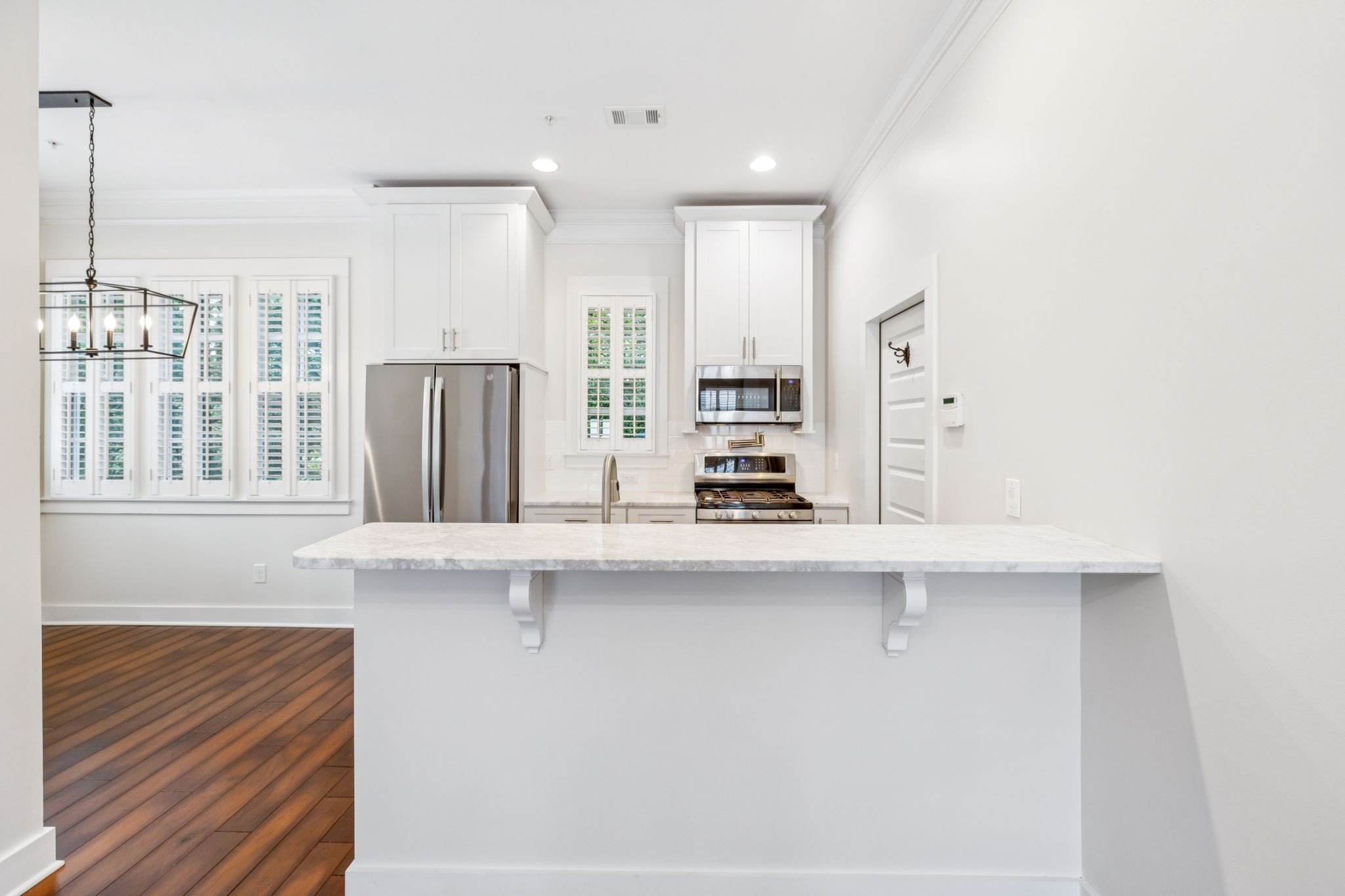 100 Cottage Lane Franklin, TN 37064 - Photo 13 of 64 a kitchen with stainless steel appliances a sink and a refrigerator