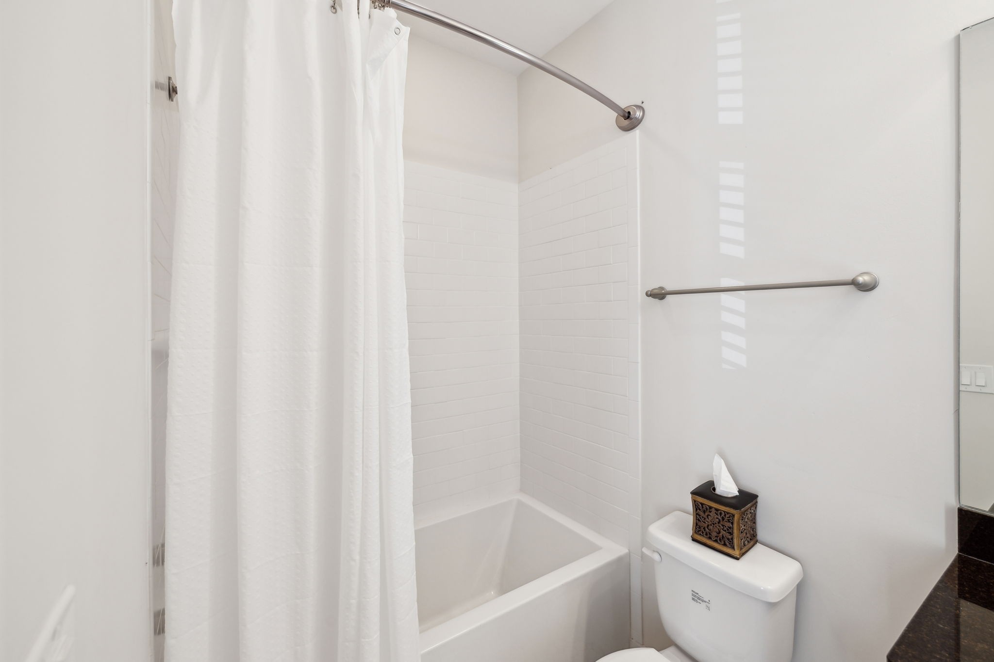 100 Cottage Lane Franklin, TN 37064 - Photo 35 of 64 a white bath tub sitting next to a white toilet and sink