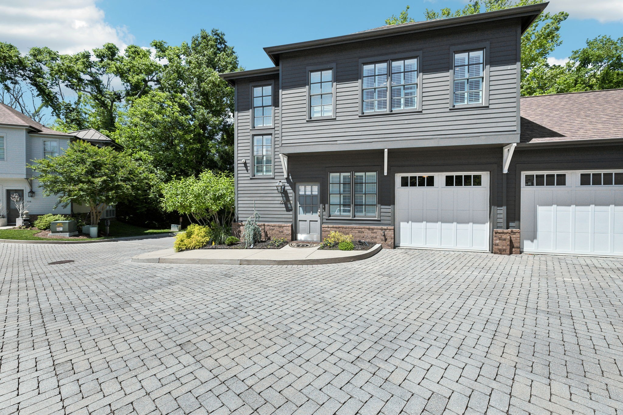 100 Cottage Lane Franklin, TN 37064 - Photo 4 of 64 a front view of a house with a yard