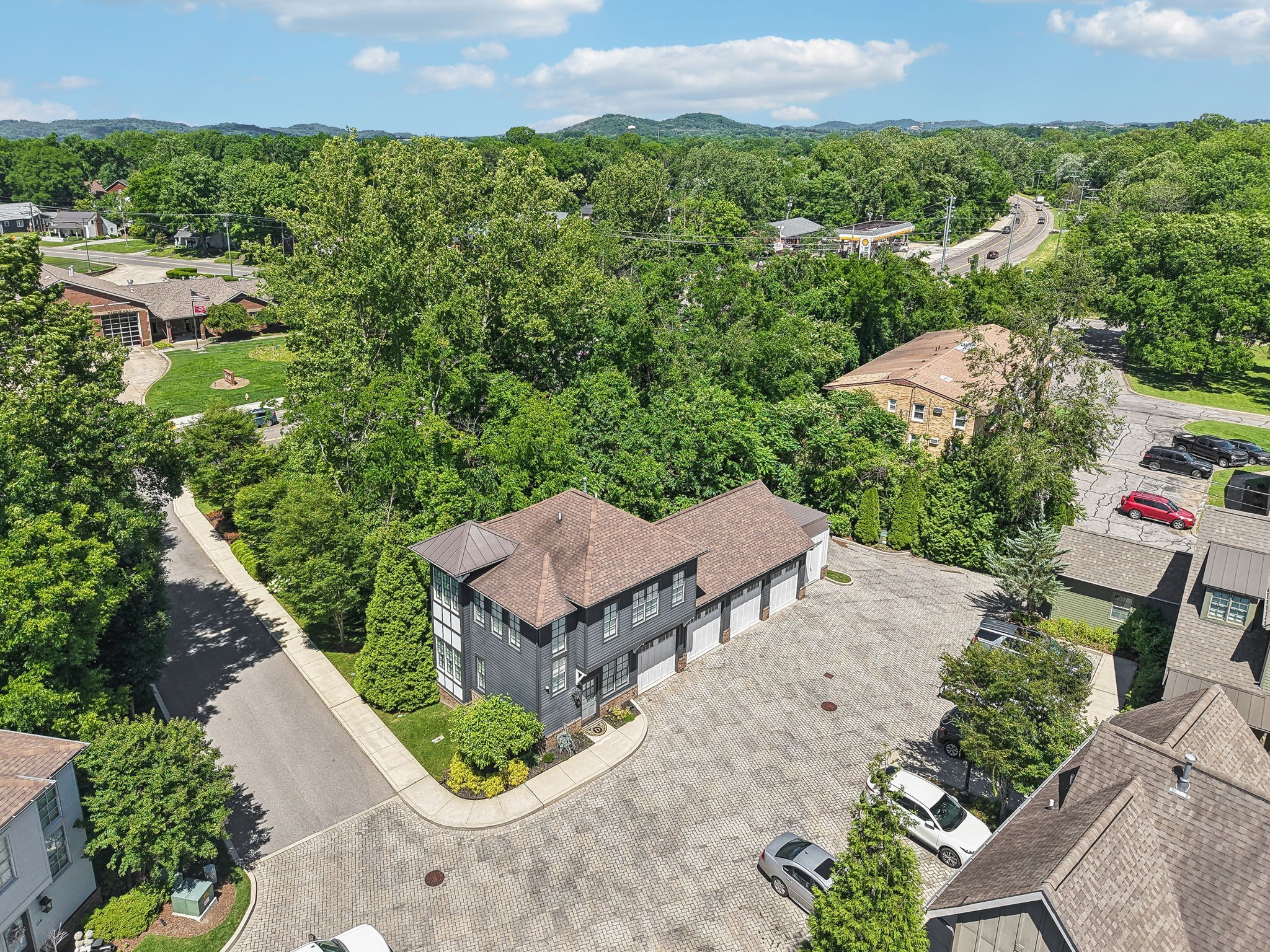 100 Cottage Lane Franklin, TN 37064 - Photo 60 of 64 an aerial view of a house with a garden
