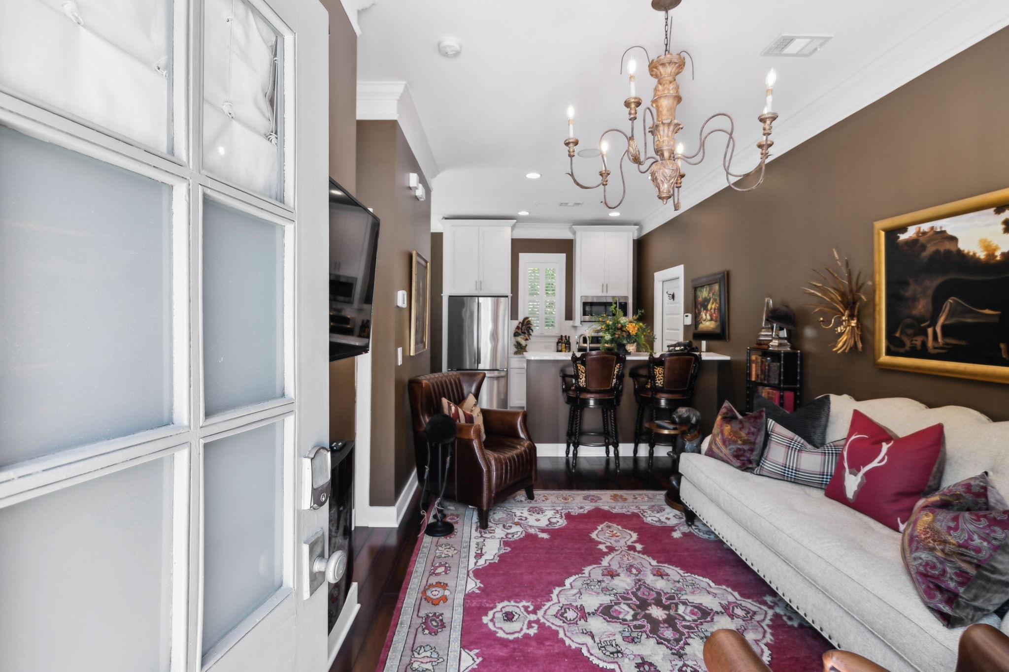 100 Cottage Lane Franklin, TN 37064 - Photo 8 of 64 a living room with lots of furniture and a chandelier
