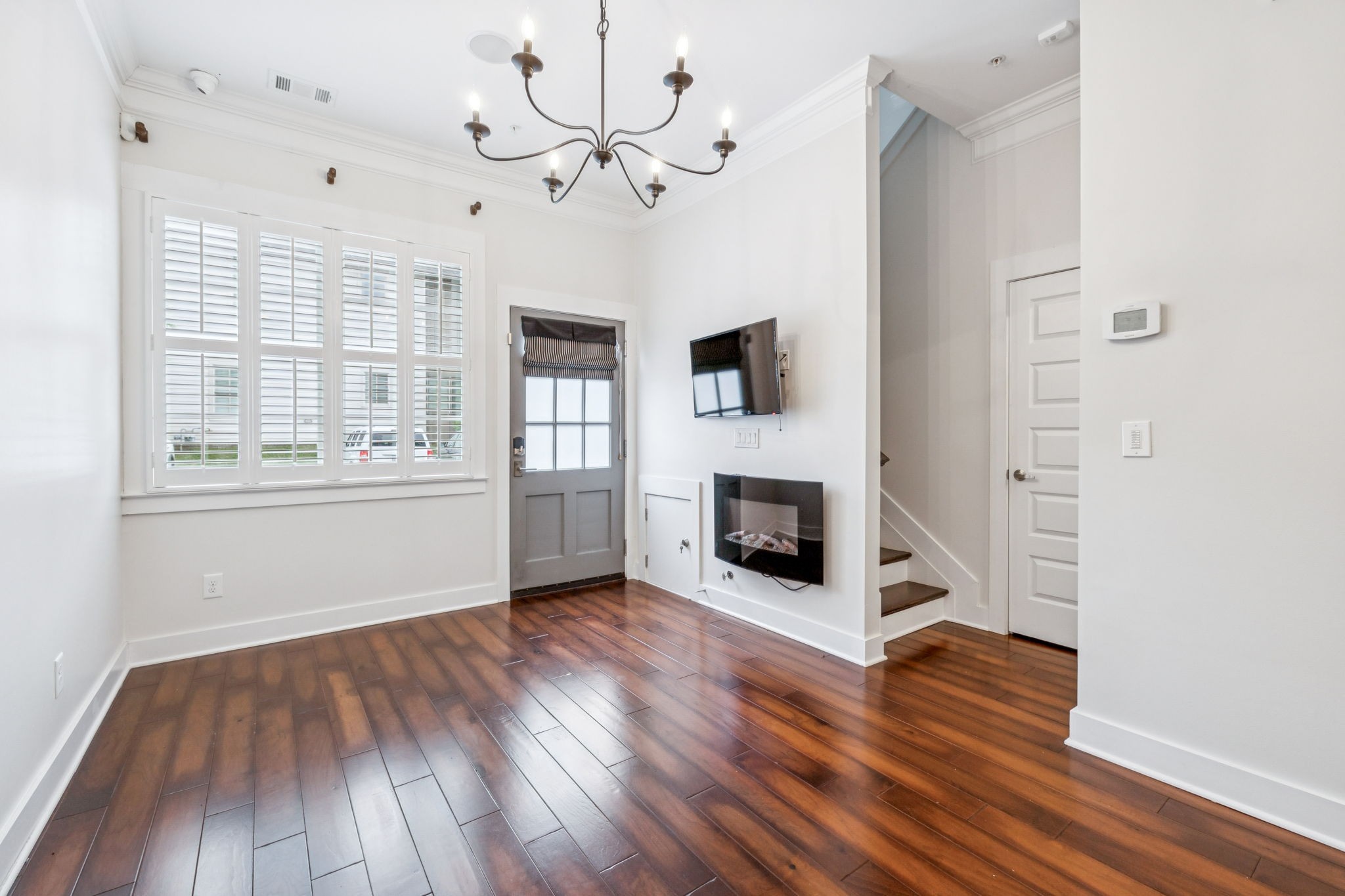 100 Cottage Lane Franklin, TN 37064 - Photo 10 of 64 a view of an empty room with wooden floor and a window