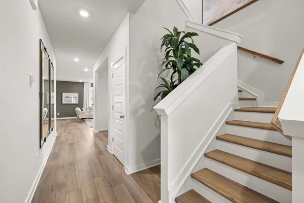 a workspace with furniture window and wooden floor