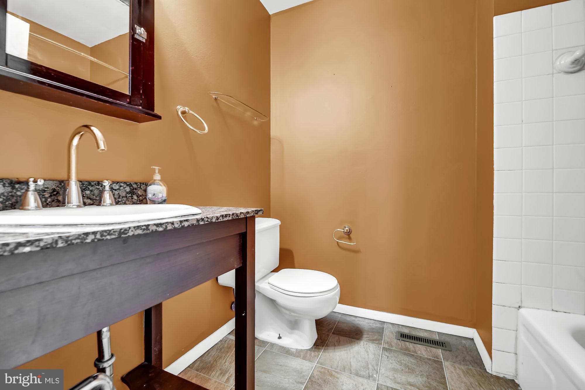 72 Ridgelawn Road, Unit D Reisterstown, MD 21136 - Photo 21 of 28 Full bath with updated vanity