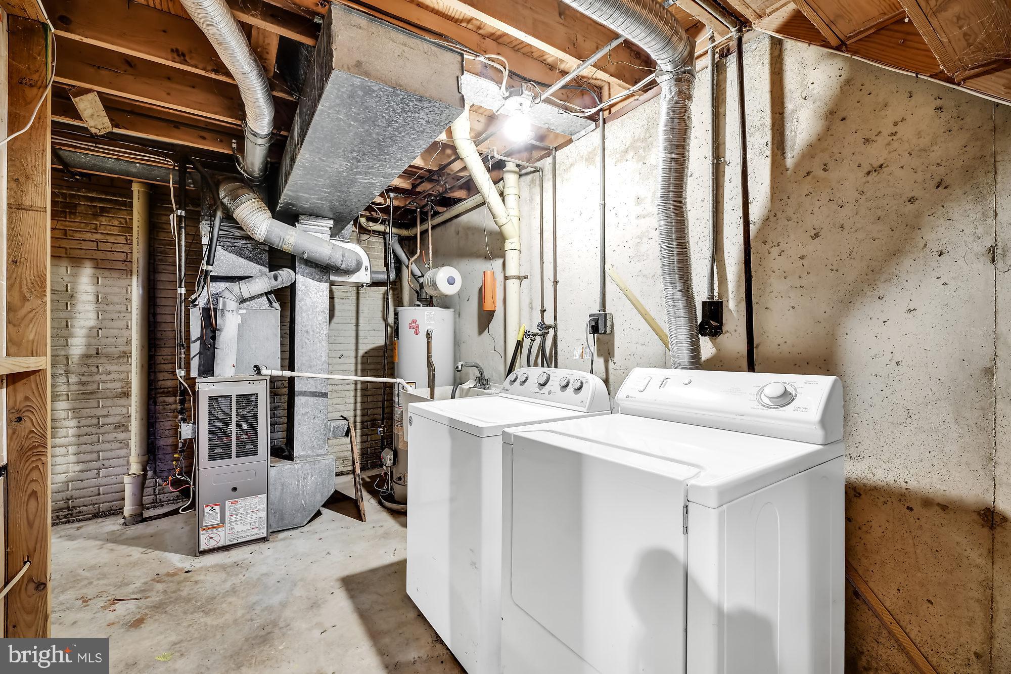 72 Ridgelawn Road, Unit D Reisterstown, MD 21136 - Photo 26 of 28 Lower level laundry room w/plenty of storage space