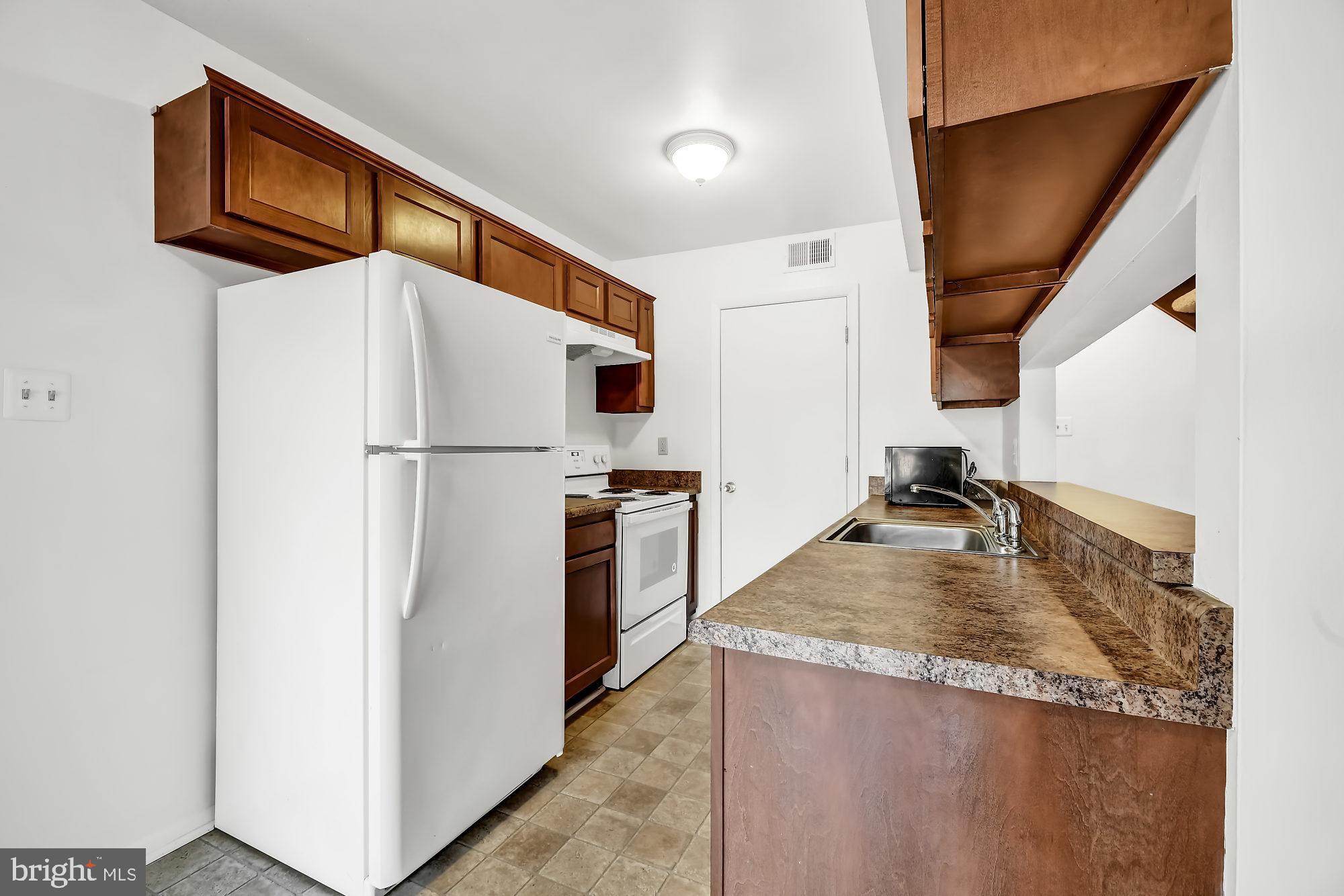 72 Ridgelawn Road, Unit D Reisterstown, MD 21136 - Photo 8 of 28 This galley kitchen includes a huge pantry