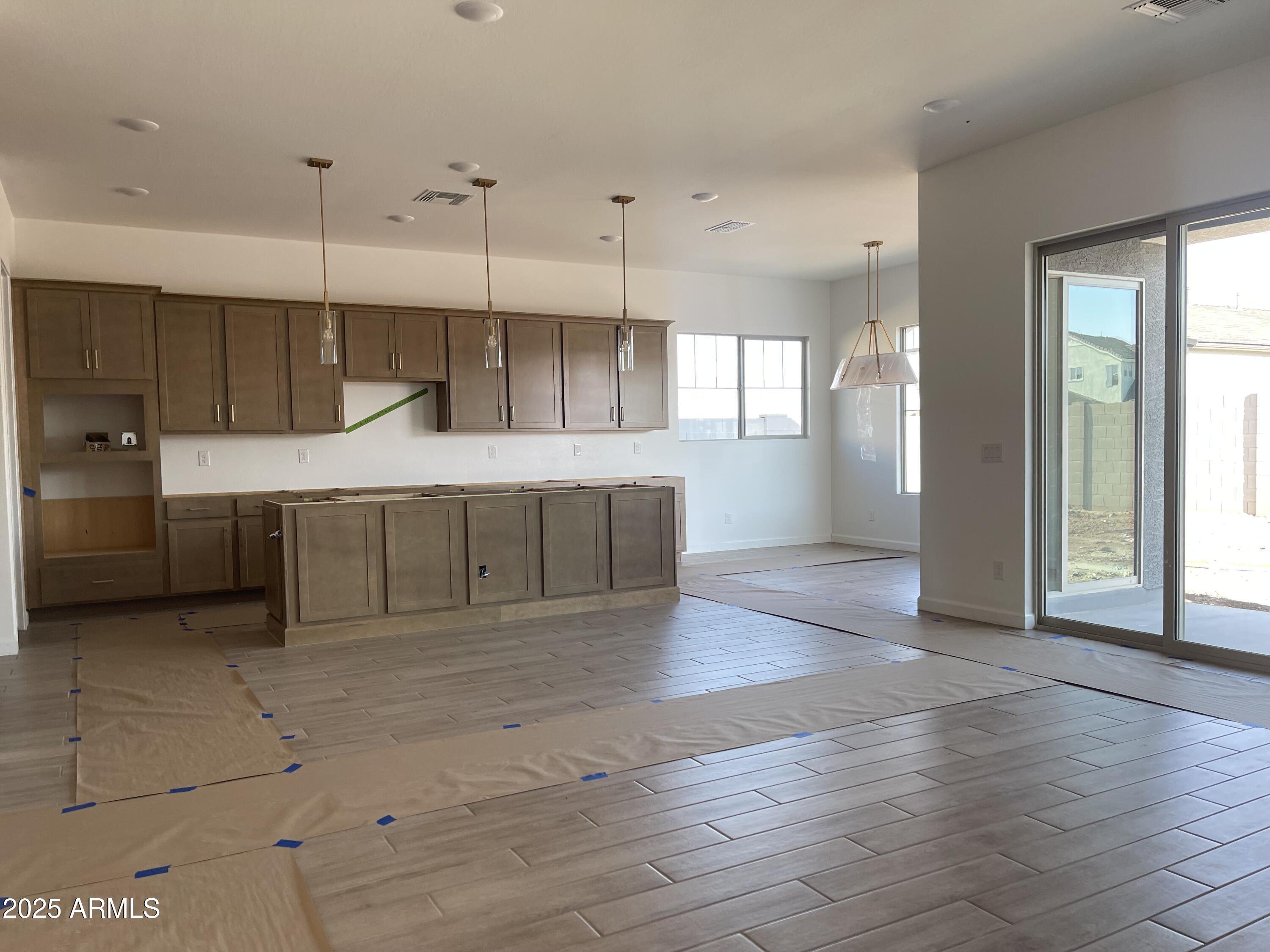 22669 East Saddle Way Queen Creek, AZ 85142 - Photo 27 of 46 026 Greatroom kitchen
